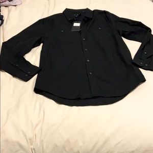 Black button up dress shirt. Five four.